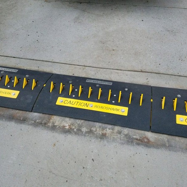 Roadshark Surface Mount Motorized One-Way Traffic Spike System with 8" Master Controller and 20.25' of Traffic Spikes
