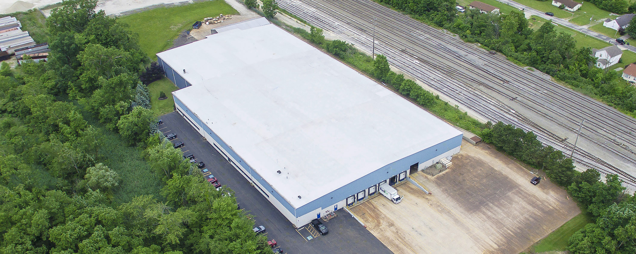 Wide aerial view of DF Supply Inc. Building